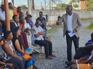 Hon. Binwell Chansa Mpundu addresses Nkana constituents at an outdoor community meeting in Kitwe, Copperbelt, Zambia